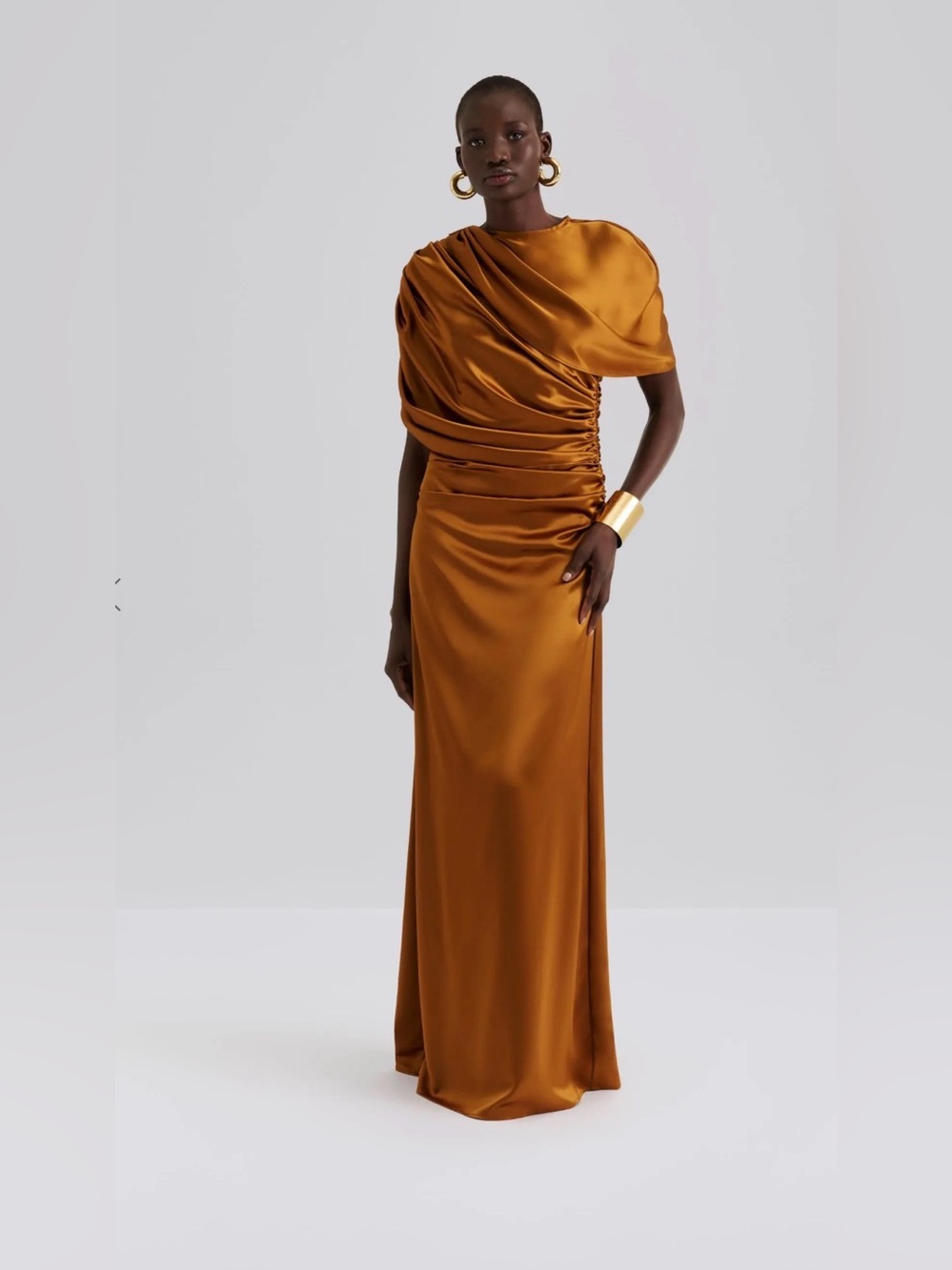 By Malina Draped One-Shoulder Satin Maxi Dress in Amber Brown